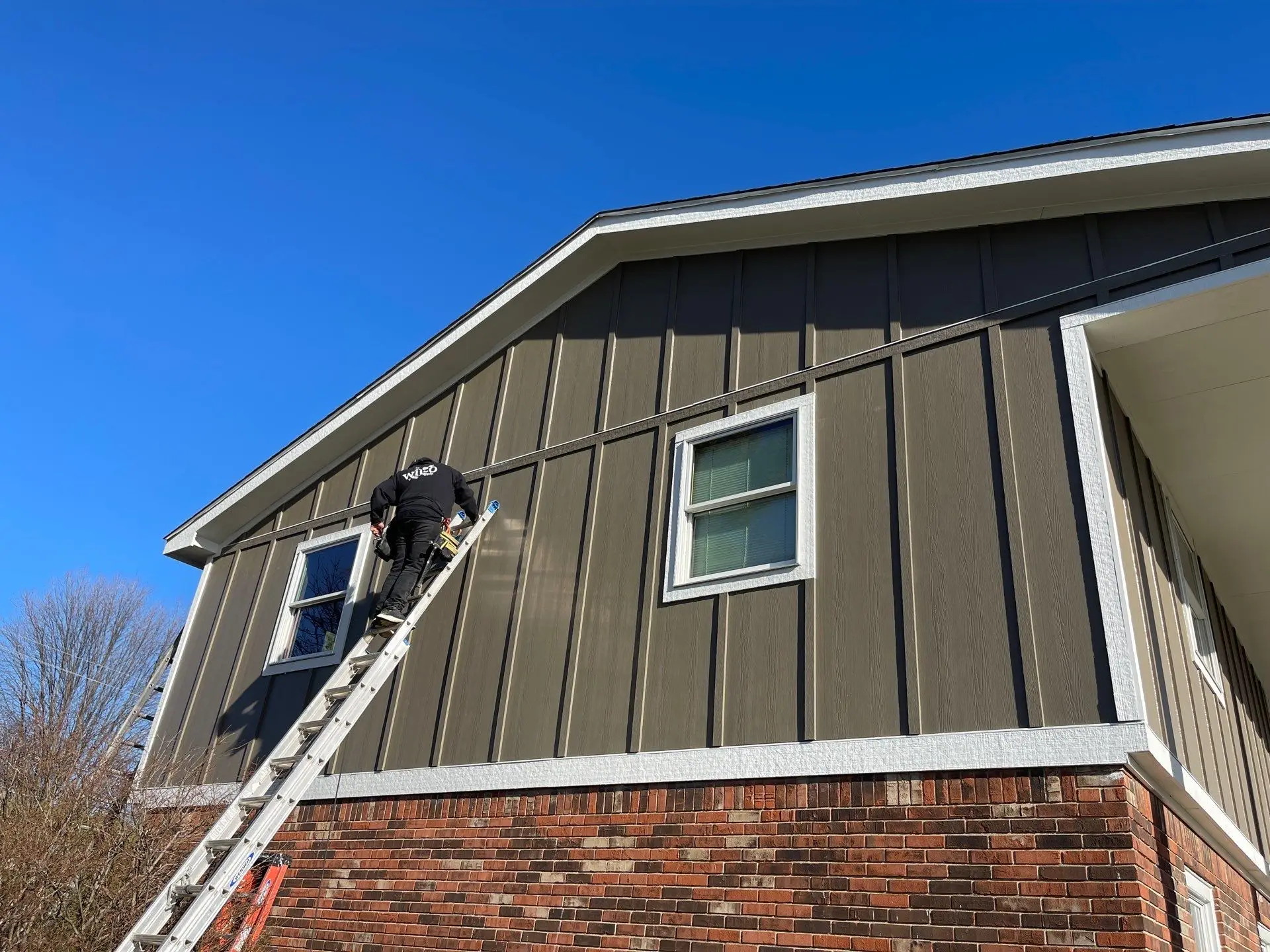 Various siding samples displayed to highlight the best siding options for Indianapolis homes, showing different colors and textures