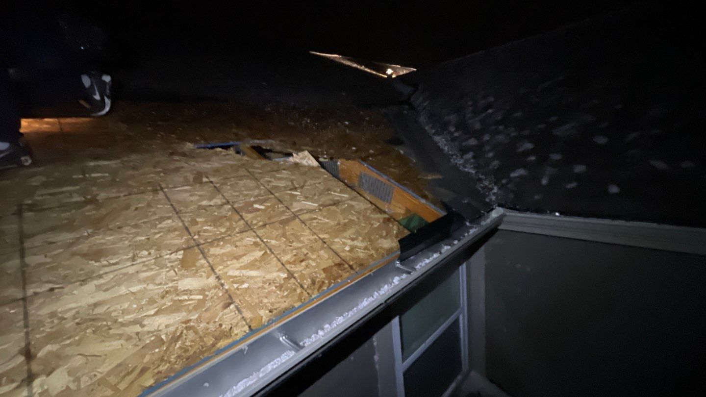 image of a home in need of emergency roof repair