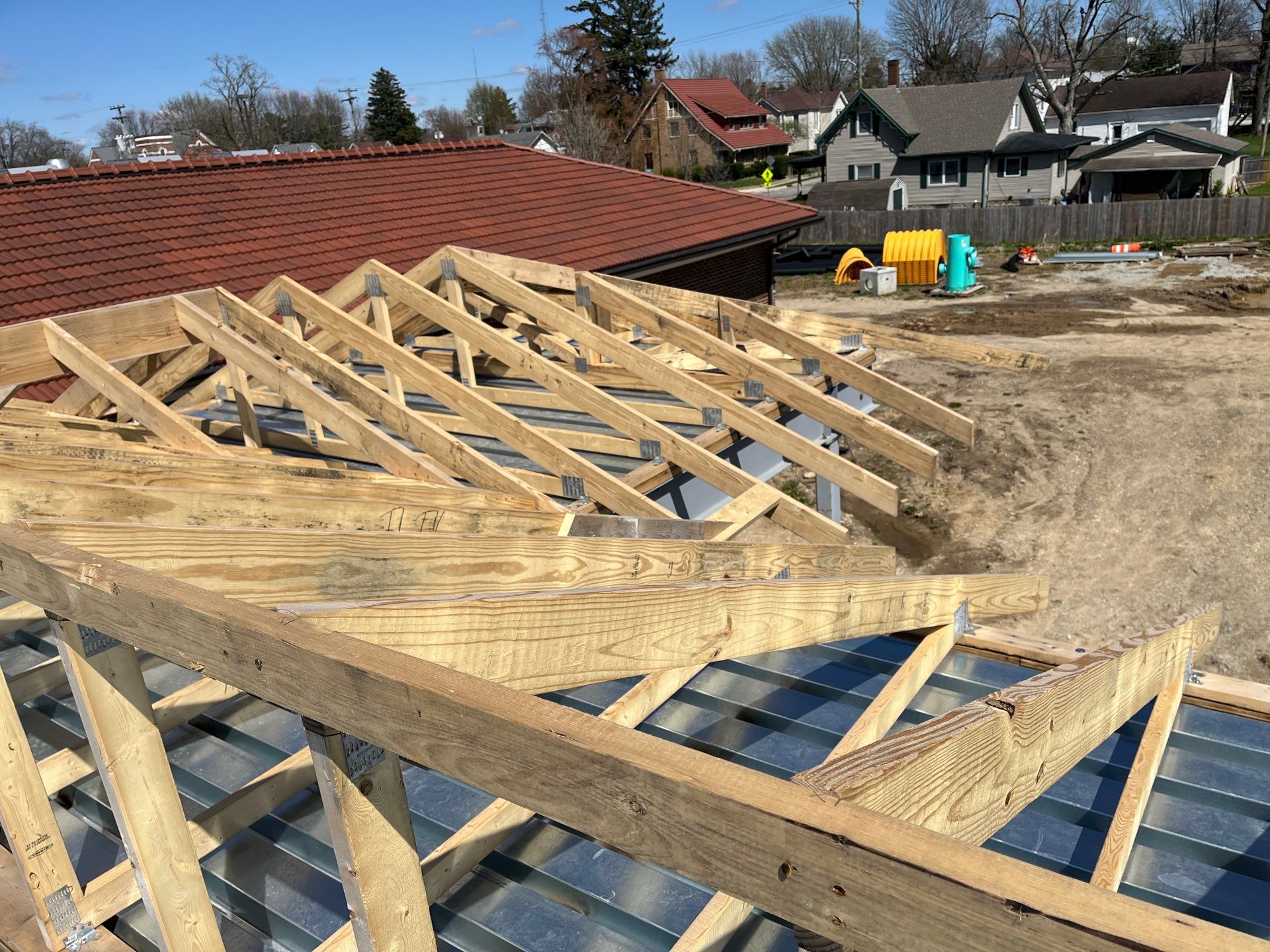 Custom trusses and metal decking installed over structural steel