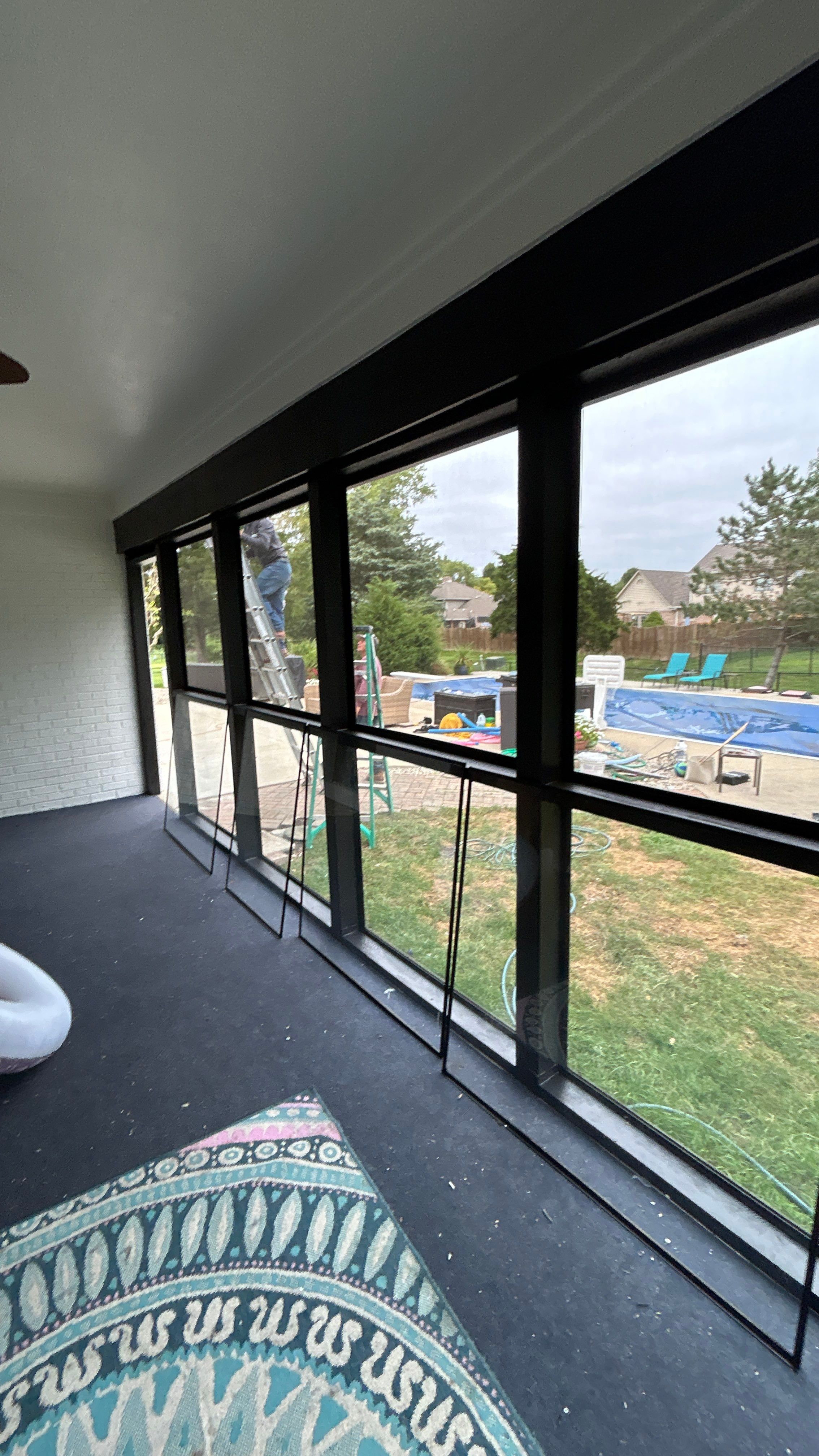 Screen porch window inserts painted to match the new color scheme